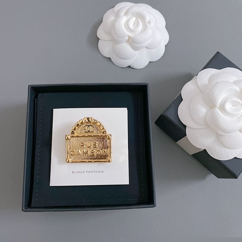 Ch*el brooches